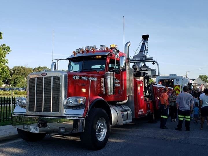 Large red road truck at Touch-A-Truck event