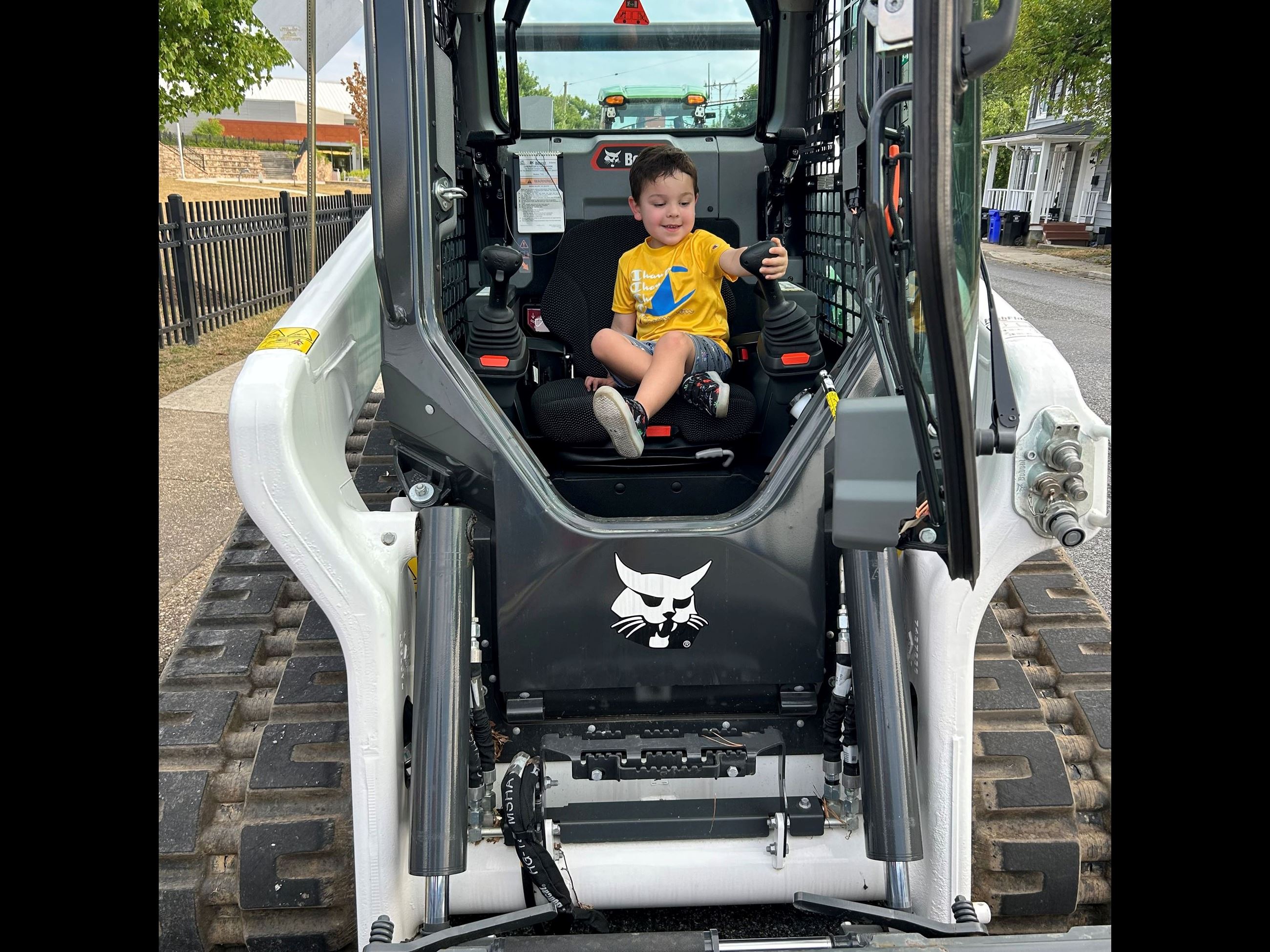 A picture of a kid in a truck