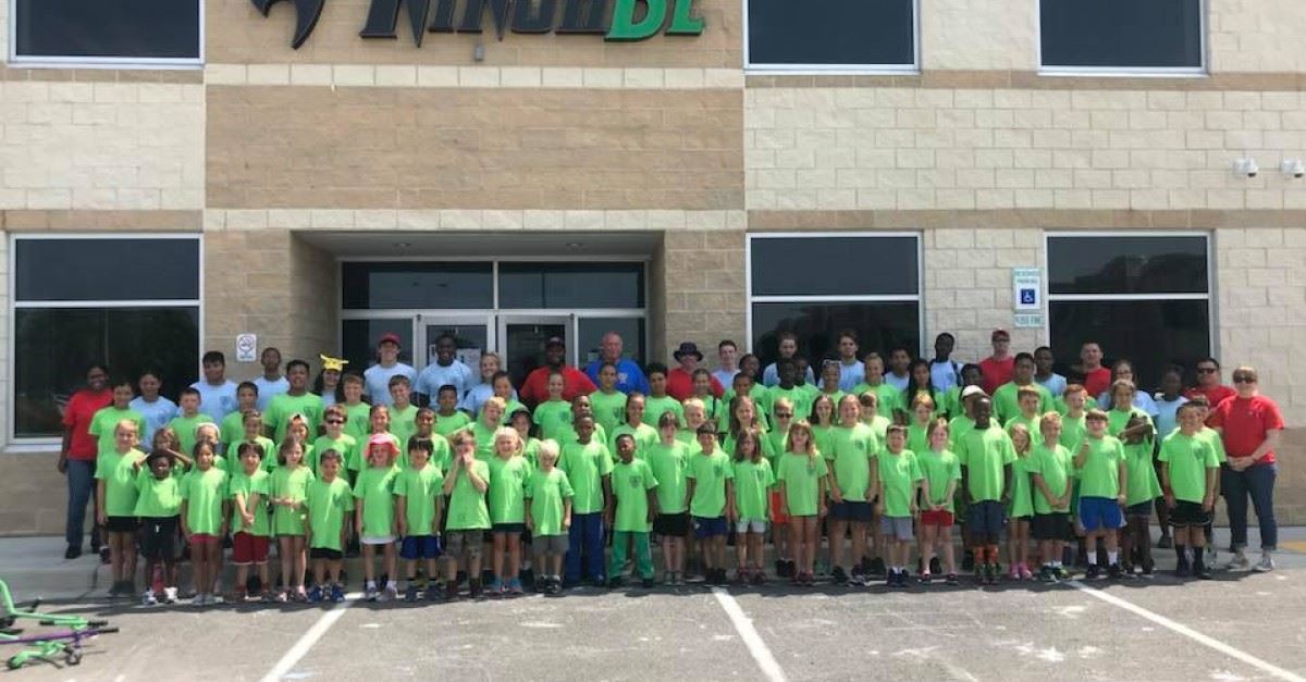 Children and Adults Lined Up